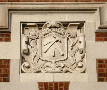 This photo of a bas-relief frieze that adorns the facade of Garfield High School in Seattle, Washington, and which has as its theme the skilled trades, was taken by Joe Mabel.  Amazingly, the school, which was in derelict condition and destined for the wrecking ball, instead was given an $87 million makeover.  The photo is used courtesy of the GNU Free Documentation License 1.2. (http://commons.wikimedia.org/wiki/File:Seattle_-_Garfield_High_School_terracotta_-_trades_01A.jpg)